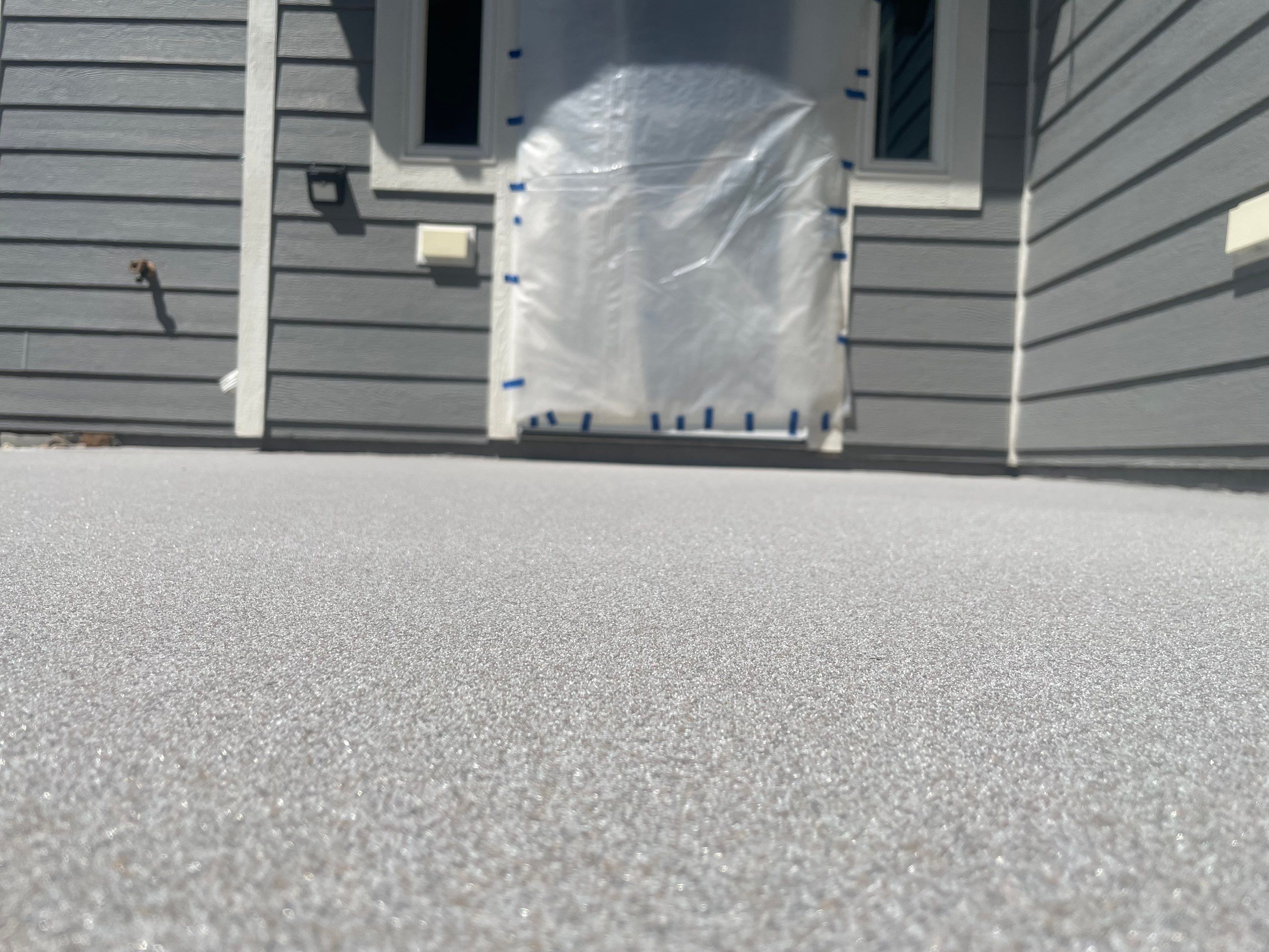 Concrete Patio Coating with Fuzzy Wool Finish in Sioux Falls by Select Painting, Coatings & Garage Cabinets