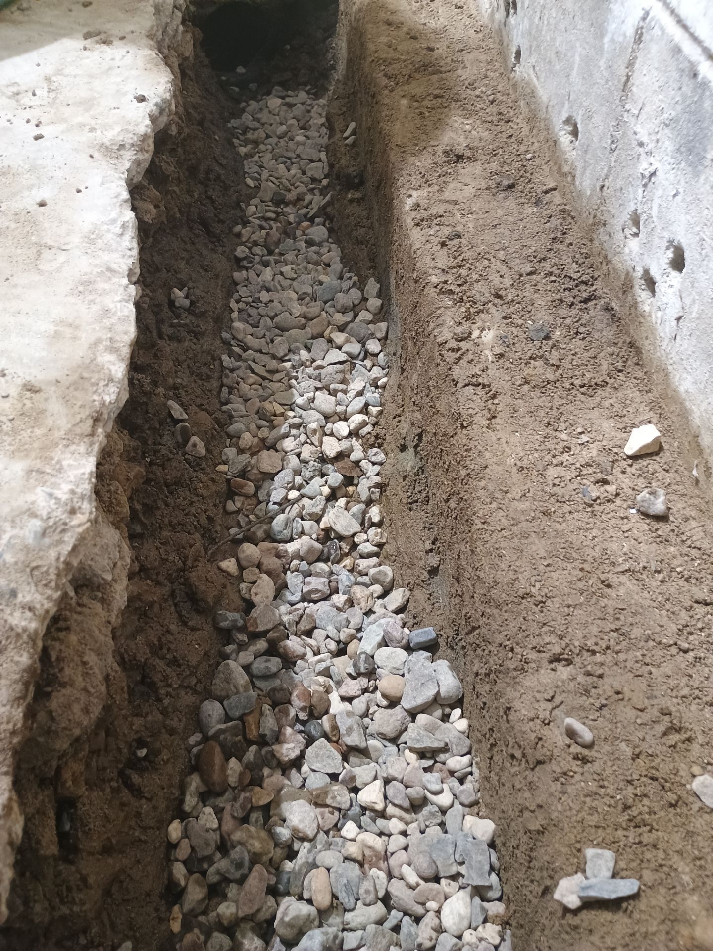 Interior Drain Tile Installation in Minnetonka, MN by Waterproofing Northeast