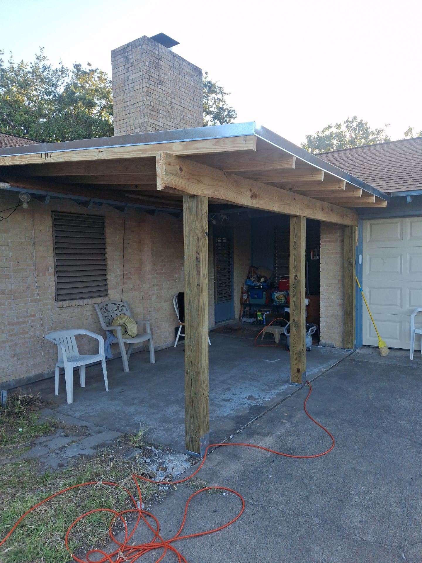 Chimneys need a Cricket.  by Bayfront Roofing and Construction