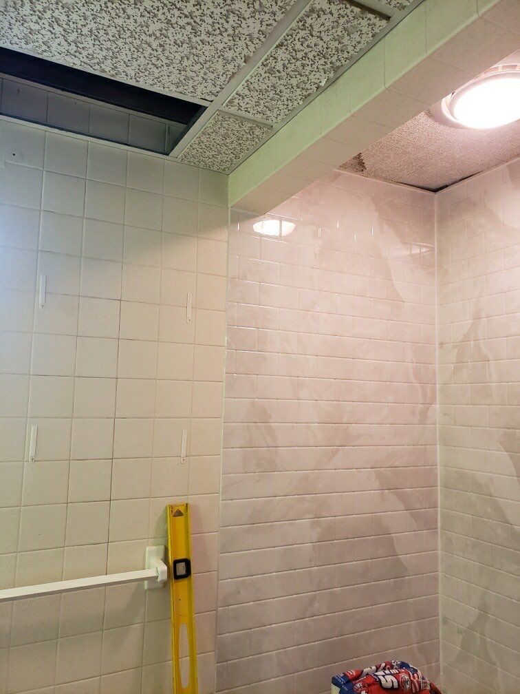 Shower Replacement using BCI Acrylic Shower System by Secure Construction Company Inc