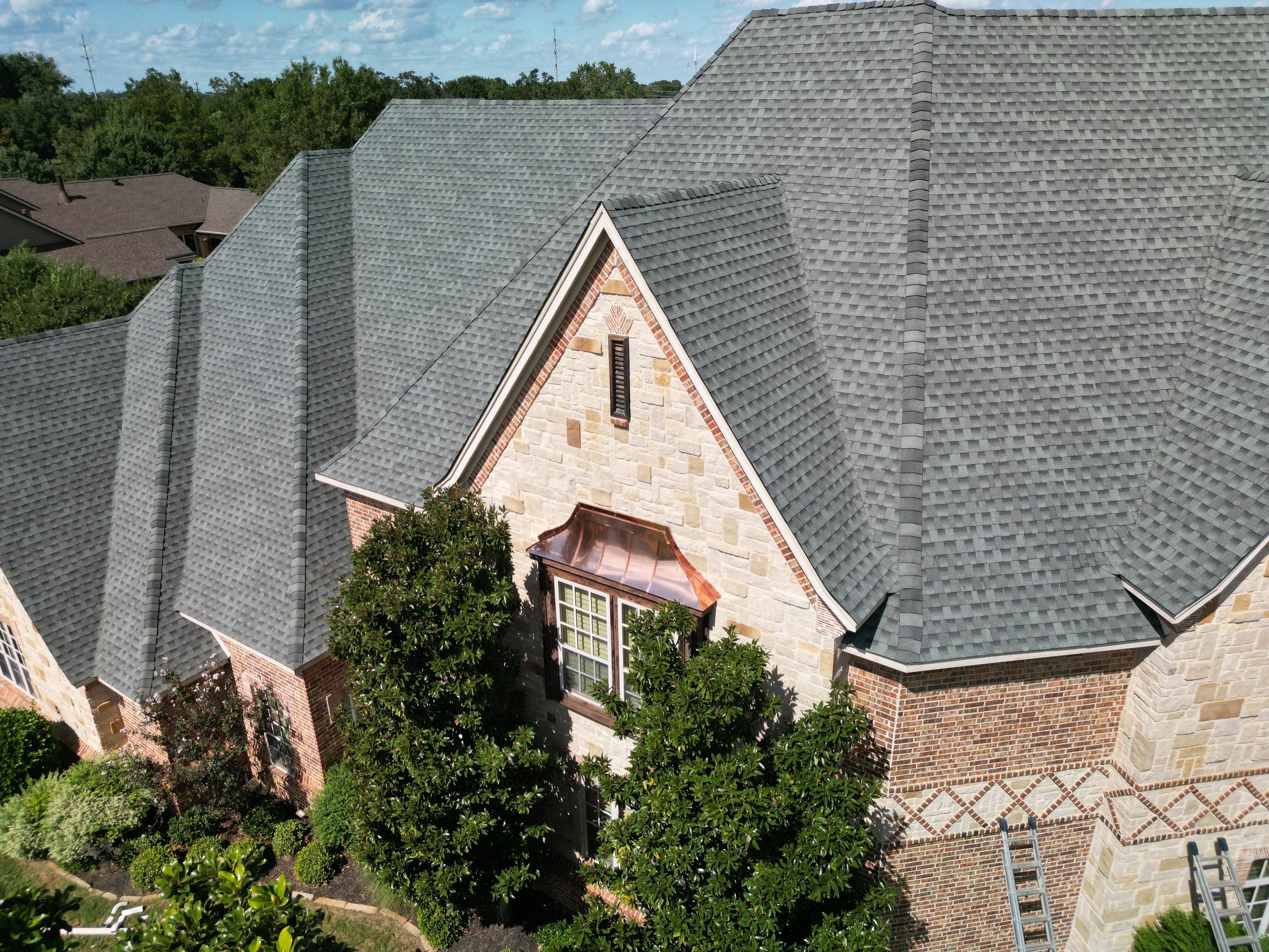 Southlake Texas Estate - Roof, Copper Awning and Gutter Project by First United Roofing & Construction
