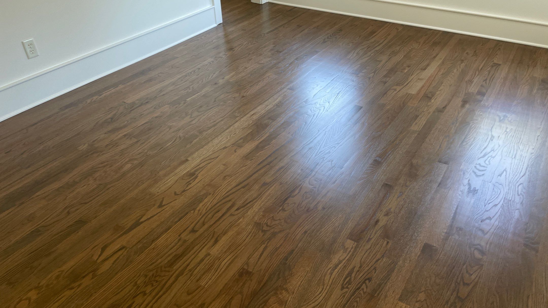 Herringbone Wood Hallway and Rooms by Footprints Floors of Coastal Carolina
