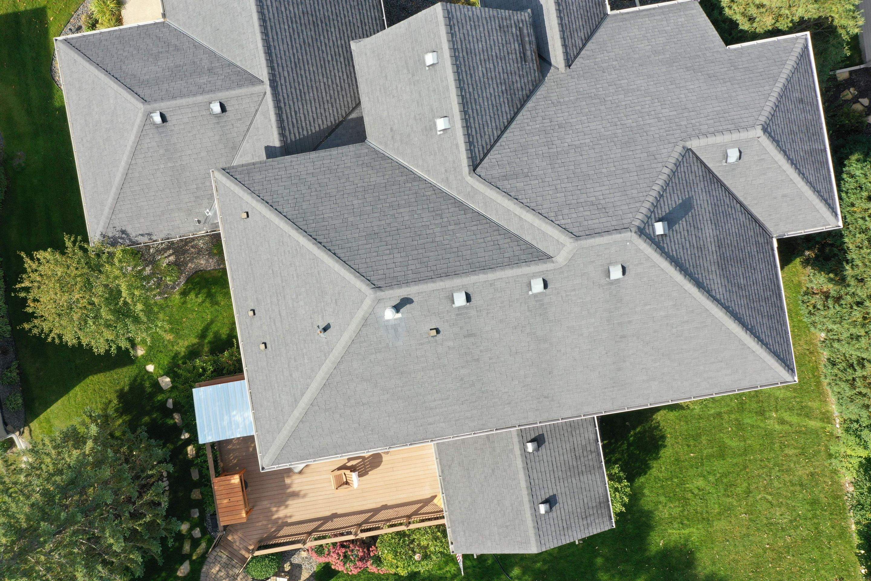 Residential Roofing Installation using Certainteed Landmark Moire Black by MODERN EXTERIOR SYSTEMS