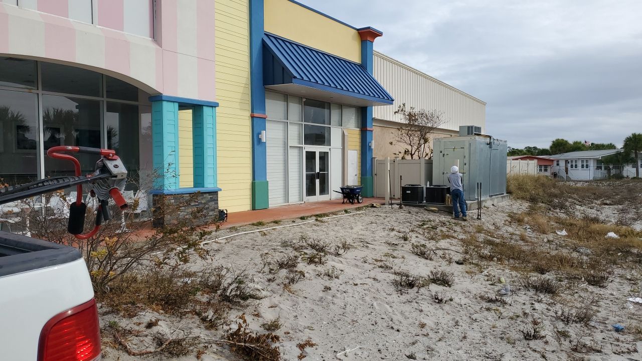 Commercial using Tan 6' Vinyl by Hip Square Fence Inc.