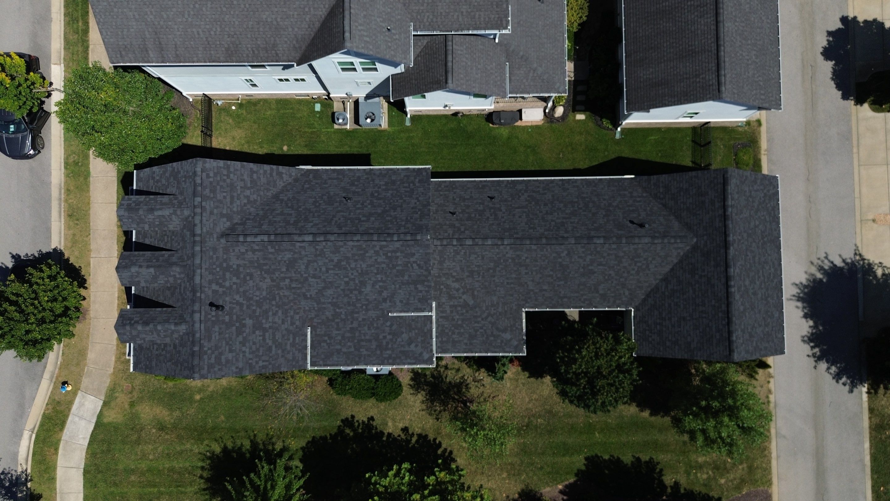 Architectural Shingle and Standing Seam Metal Roof Replacement in Franklin by Shinglesmiths Roofing