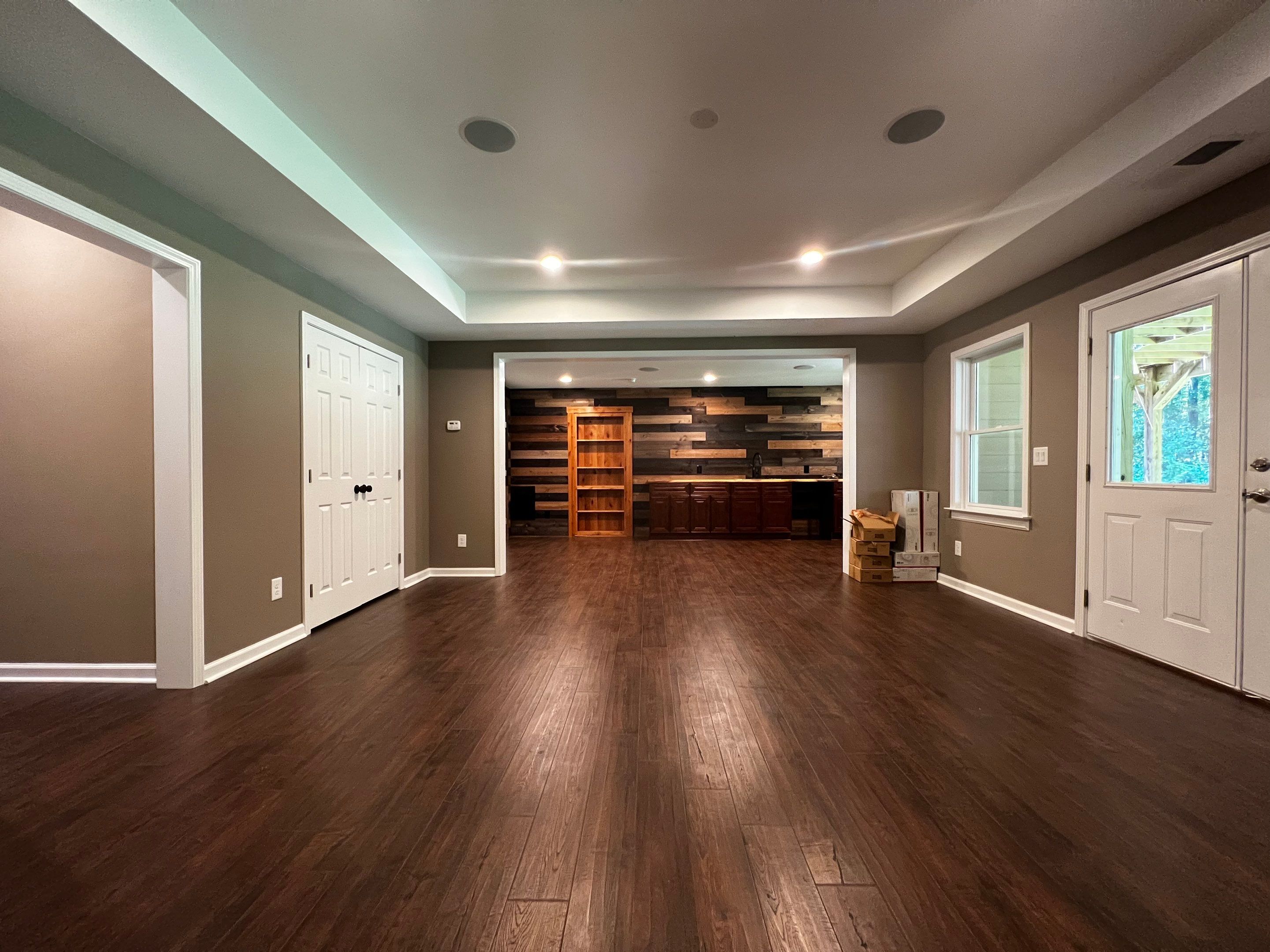 Custom Basement Remodeling With Home Theater and Bar in Woodstock by Swift Home Renovations