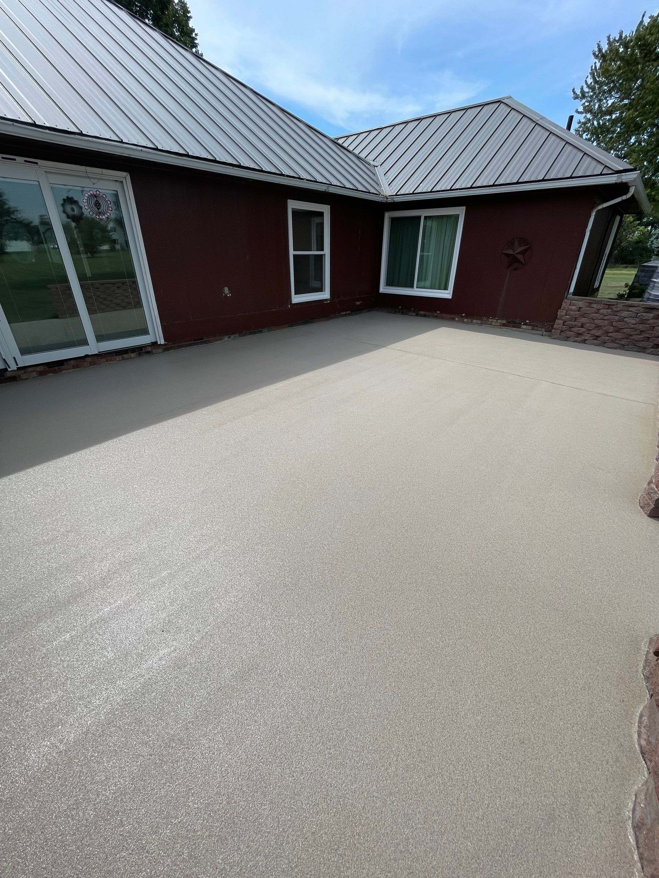 Concrete Patio Resurfacing and Protective Coating in Winfred, South Dakota by Select Painting, Coatings & Garage Cabinets