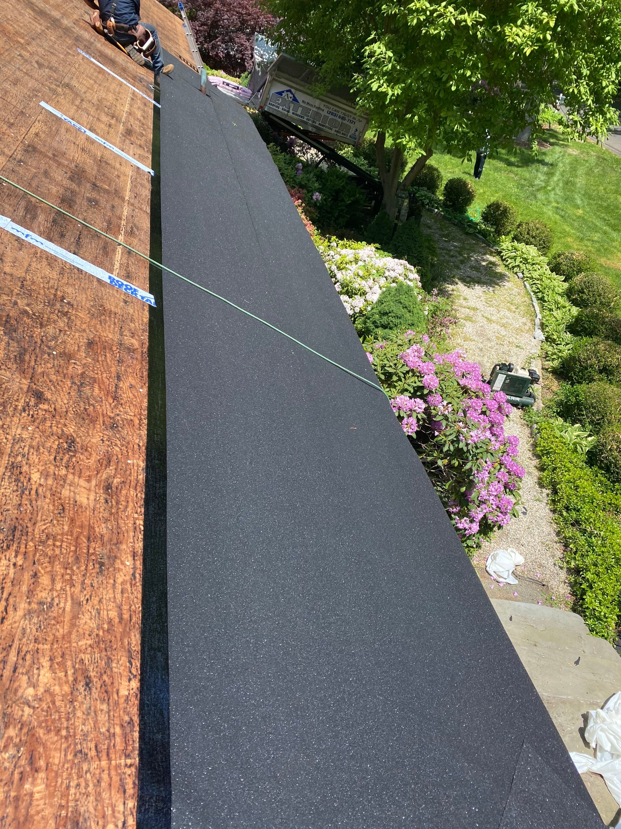 Commercial Roofing Installation using Owens Corning Duration Driftwood by A Plus Exterior