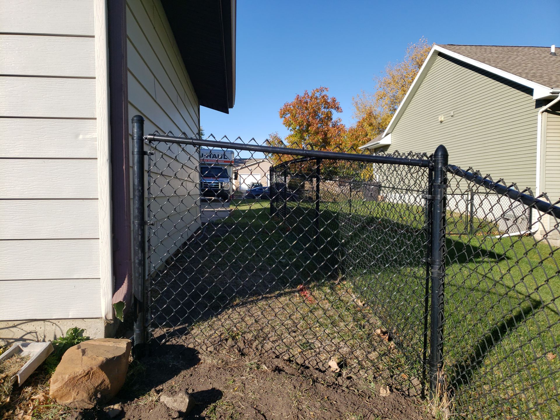 Black Chain Link Fence and Gate Installation in Cedar Falls by Perfect Picket Fence and Stain