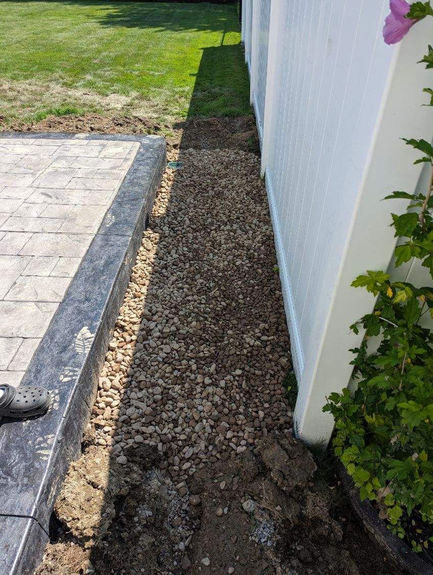 Stamped Concrete, Entry Door, and Concrete  by Ivy Lea Construction