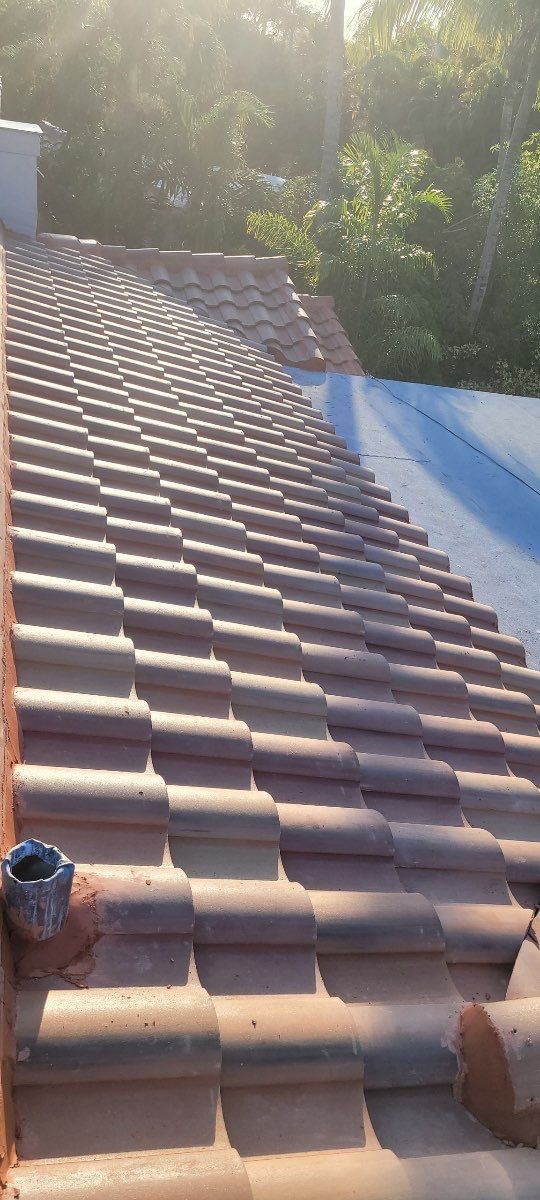 Chimney Roof Flashing Repair and New Roof by The Goat Contractor ( Giampri Corp)