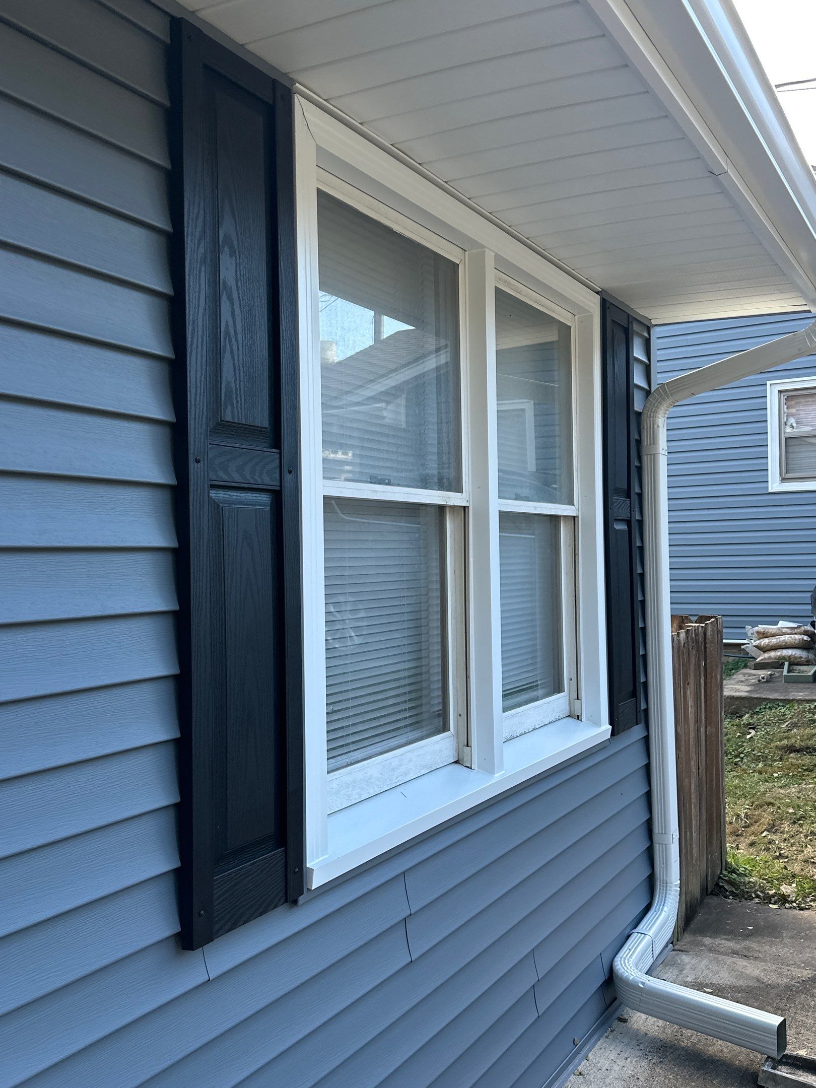 Feeling Blue in Weston Mo - Time for a Makeover by EEC Windows, Siding & Roofing