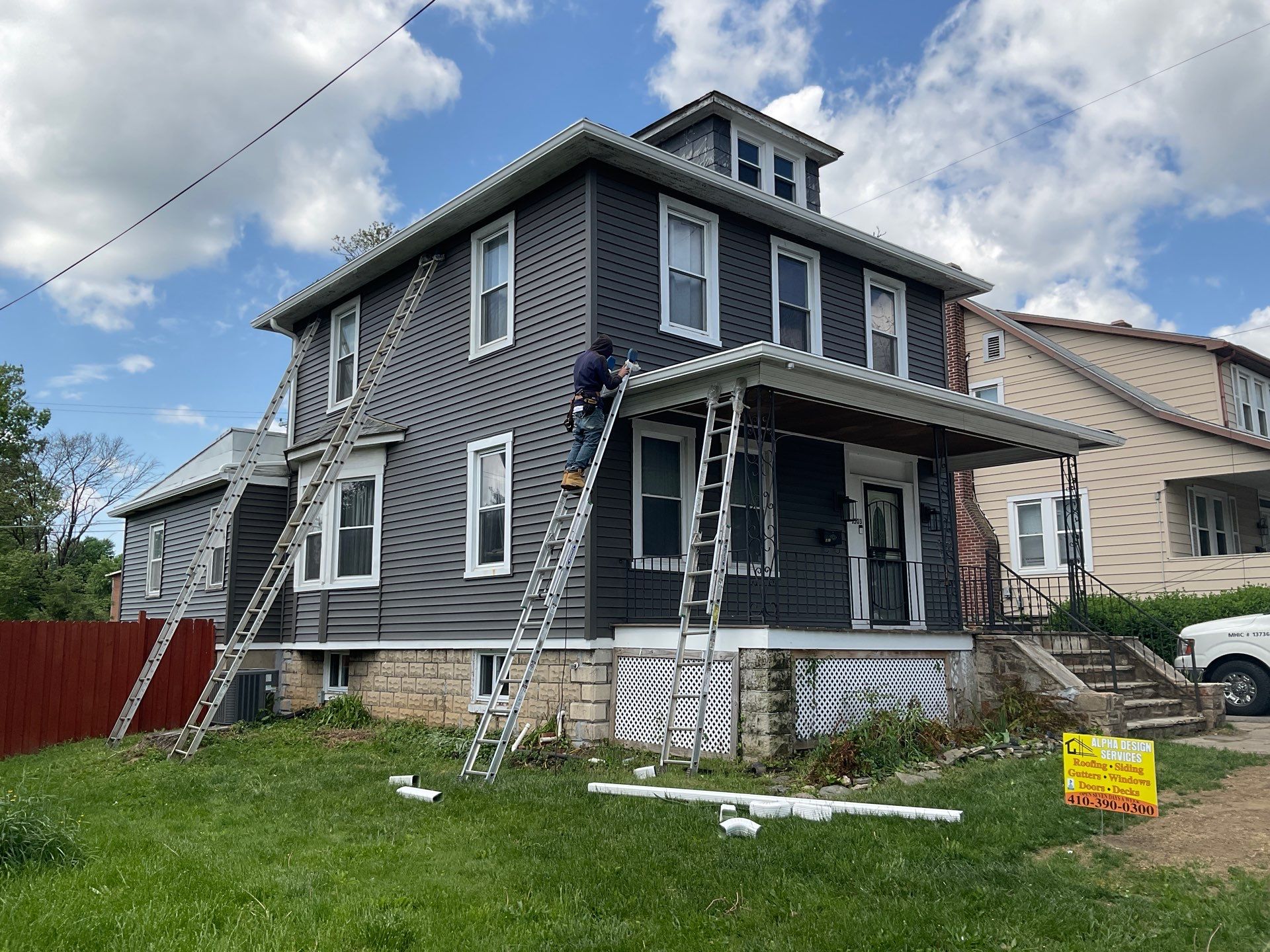 New siding & New Gutters by Alpha Design Services