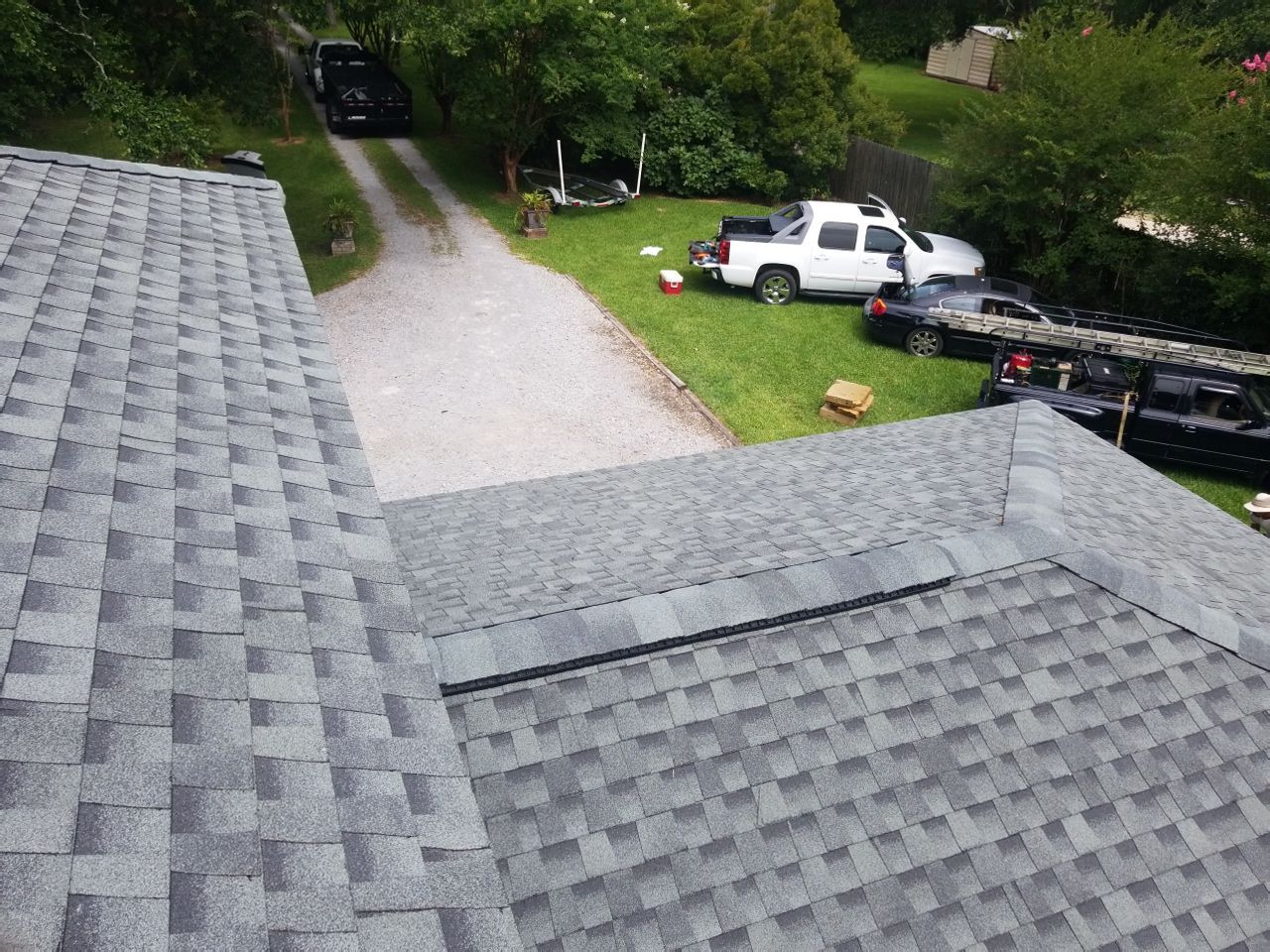Residential Roofing Installation using Roof Replacement by American Roofing & Construction LLC