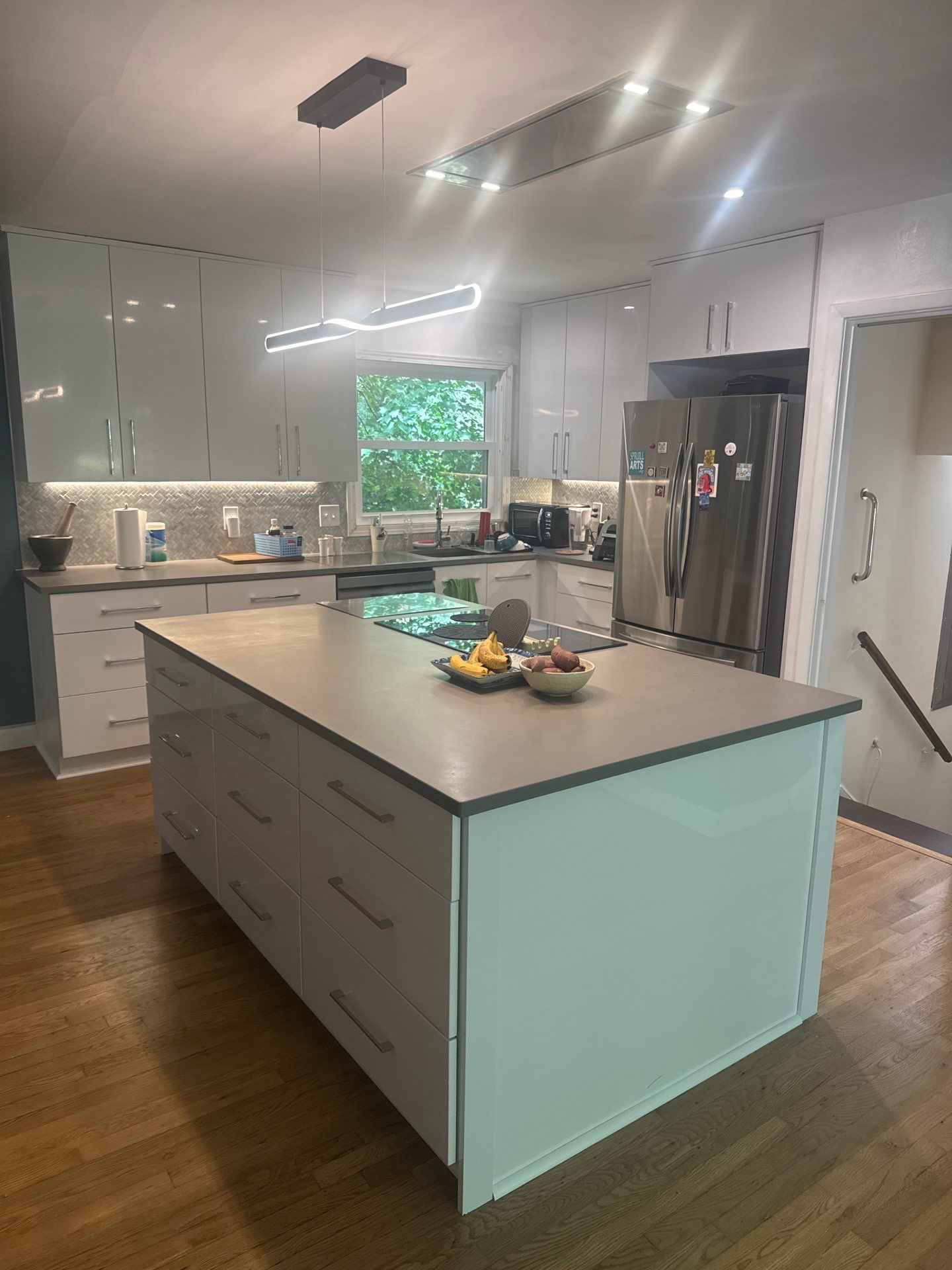 Modern Kitchen Remodeling with Large Central Island in Doraville by Swift Home Renovations