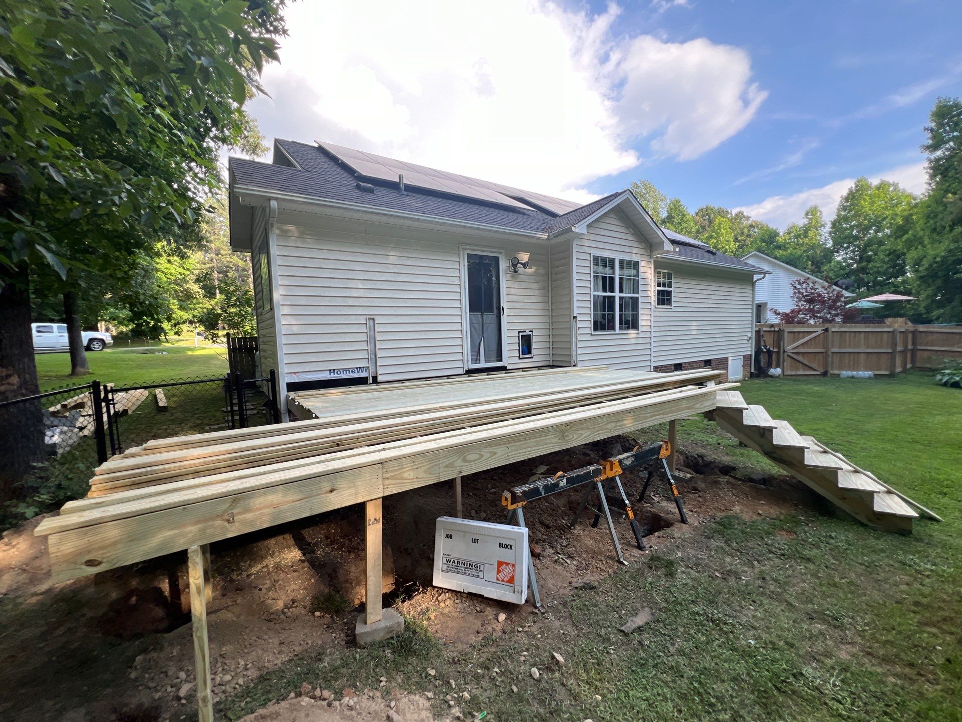 Deck Expansion and Sliding Glass Door Installation in Clayton by The Remodeling Company