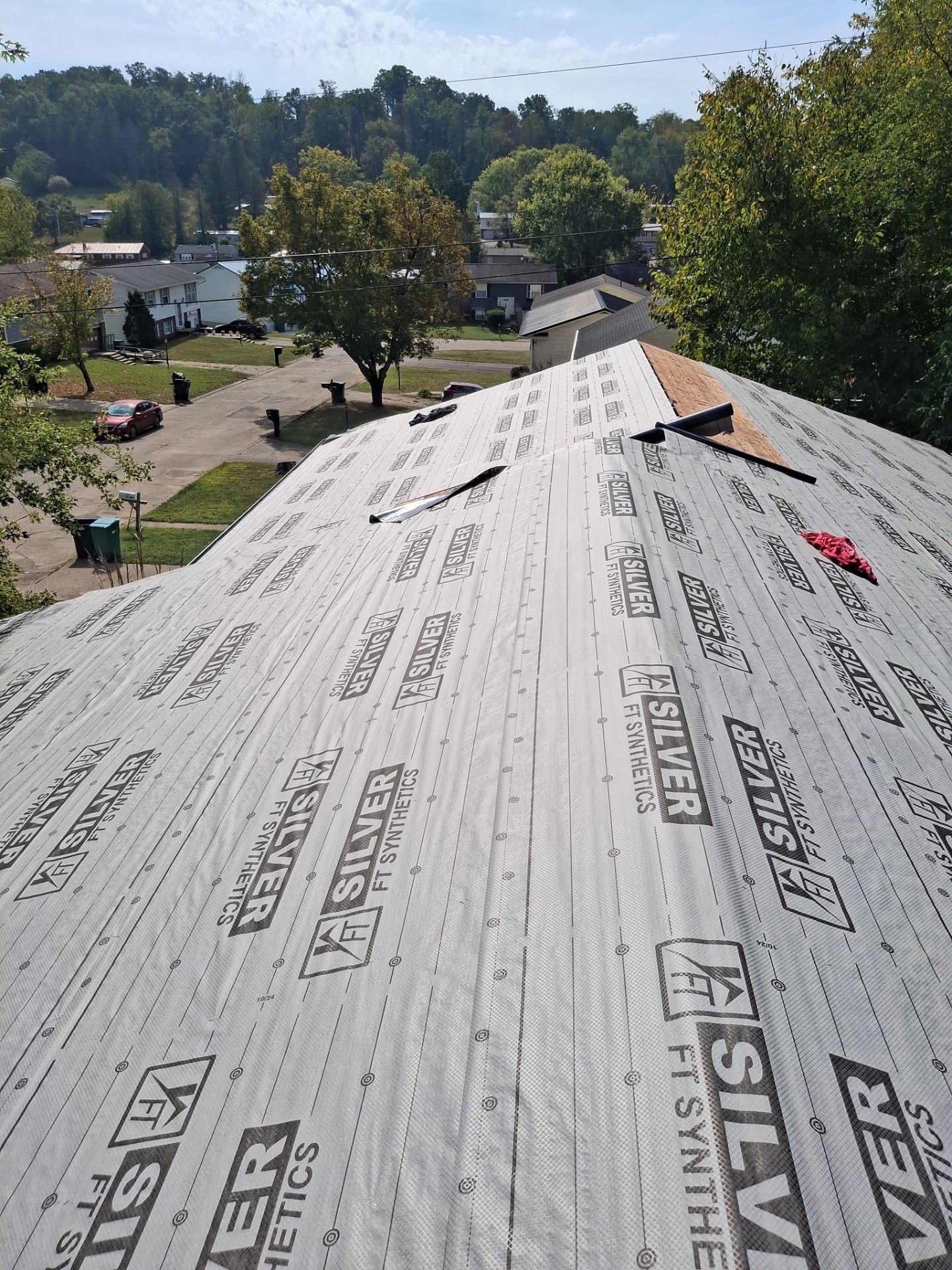 Residential Roofing Installation using Metal by Rainstoppers Roofing