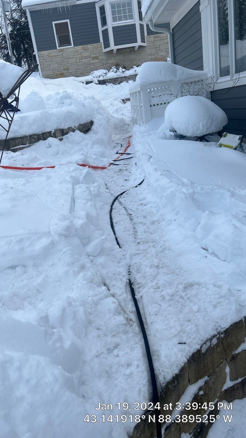 Roof Snow And Ice Dam Removal using Steamer by Total Restoration Services