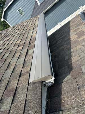 Turtle Shell gutter protection installation in Naperville, IL 60540, photograph 13