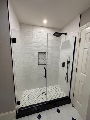 Tub to walk-in shower conversion using Glass door