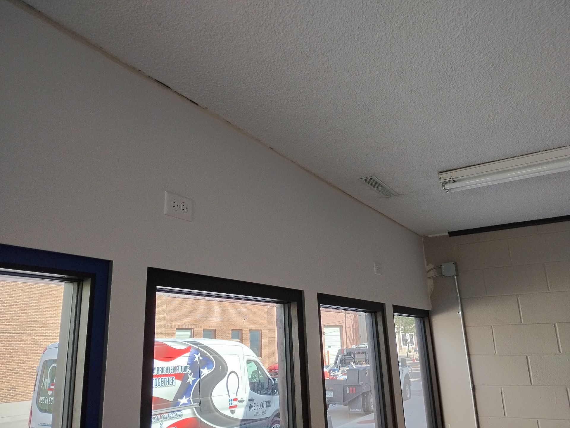 Updated Store Front for Big Red Printing by Abe Electric 