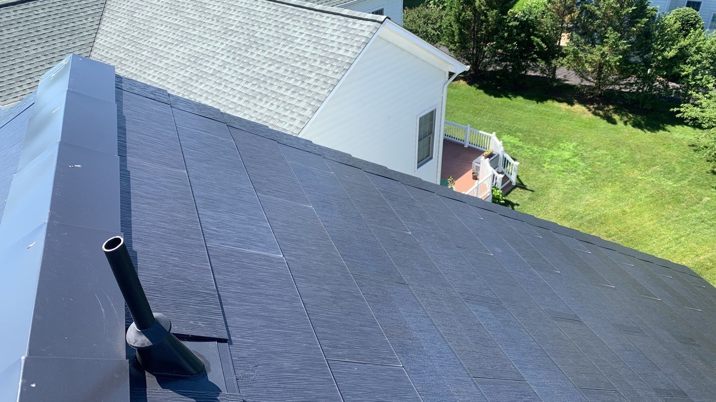 Tesla Solar Roof Replacement using Tesla Solar Roof V3 tiles by American Home Contractors