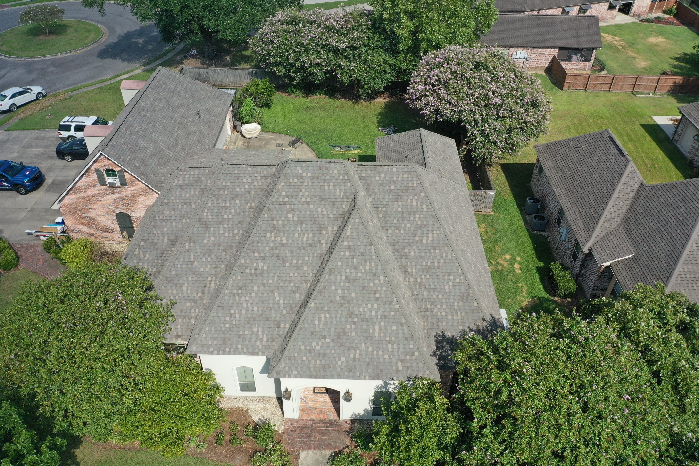 Storm Master Shake Weathered Wood with High profile Ridge Cap by Top Team Roofing & Construction