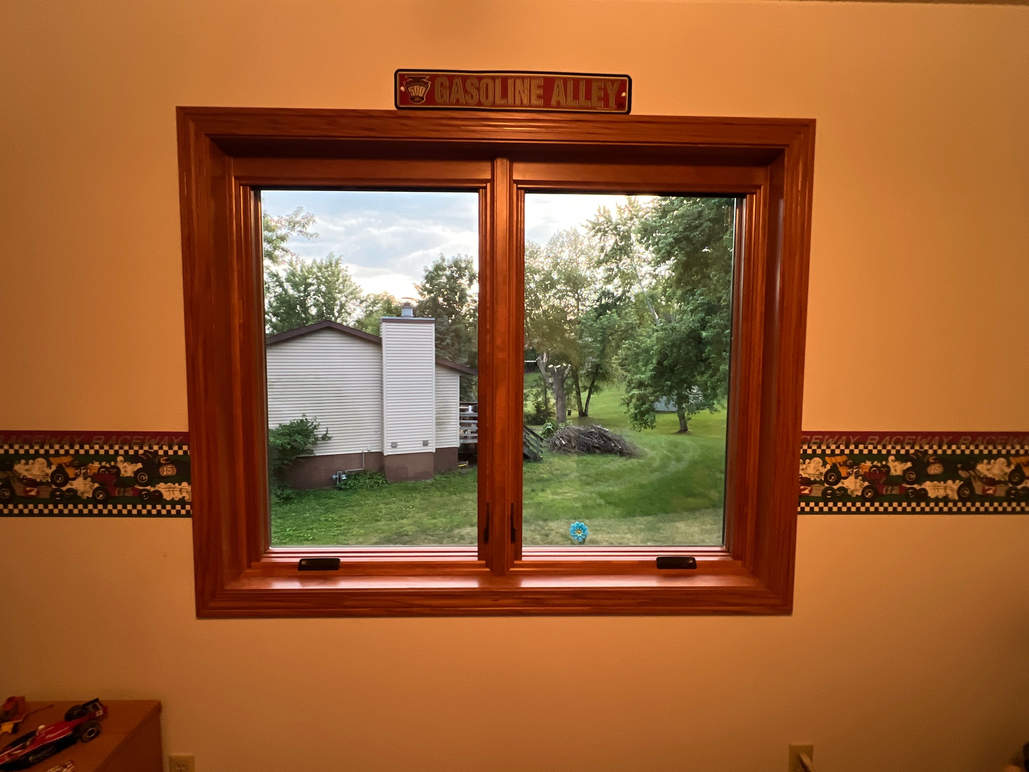 Pella Wood clad windows by United Windows and Siding LLC