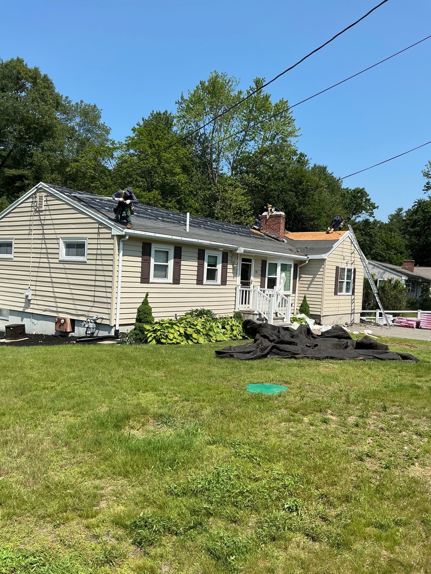 Full Roof Replacement & Chimney Repair – Onyx Black, MA by Mighty Dog Roofing of Greater Middlesex County