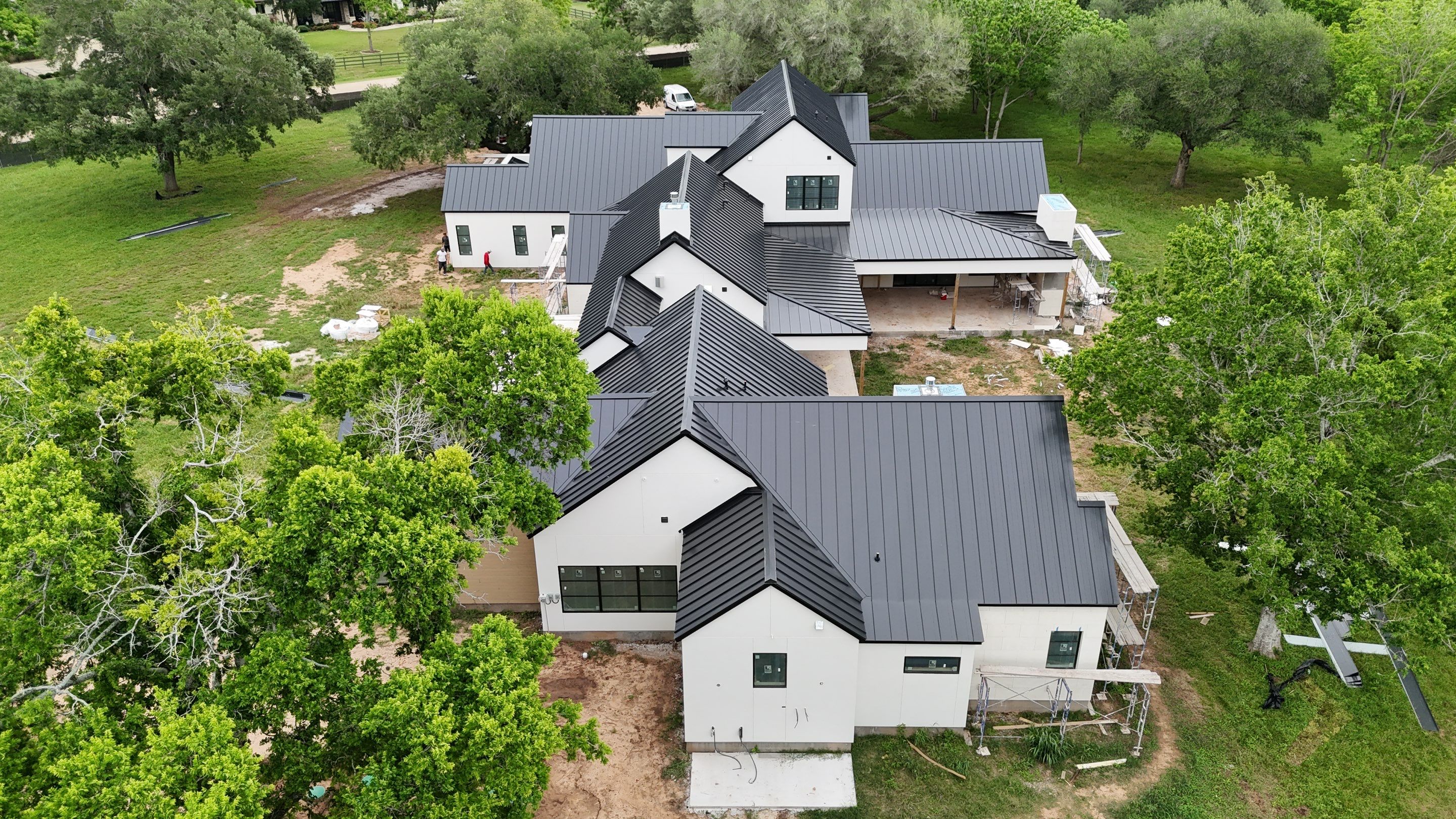 Matte Black Metal Roof by Level 7 Companies
