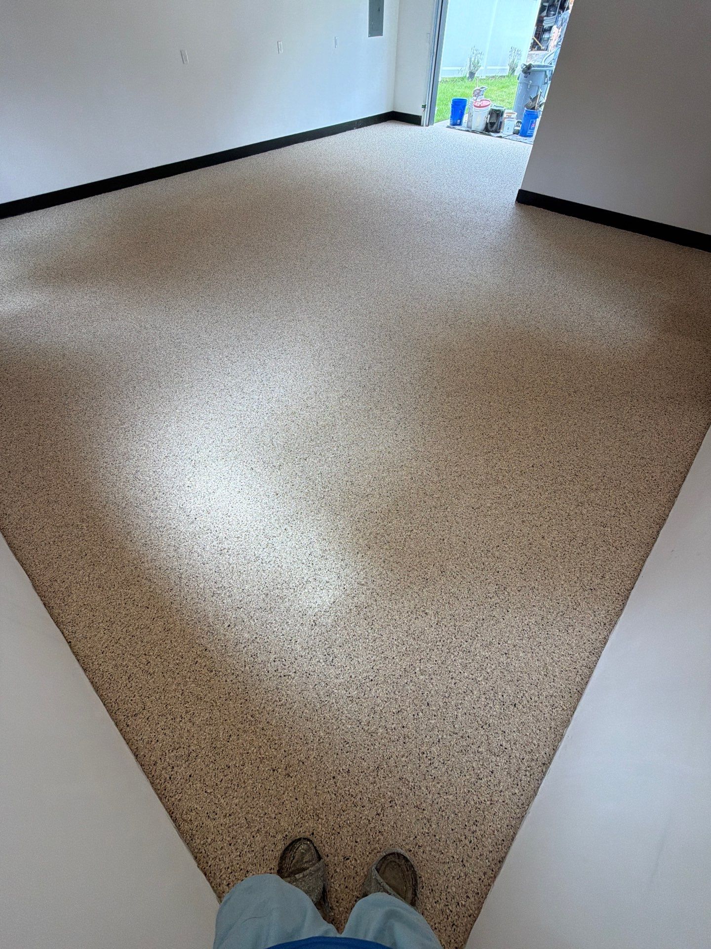 Multi-Room Epoxy Flake Floor Installation Throughout Pentwater Residence by Gordon Painting