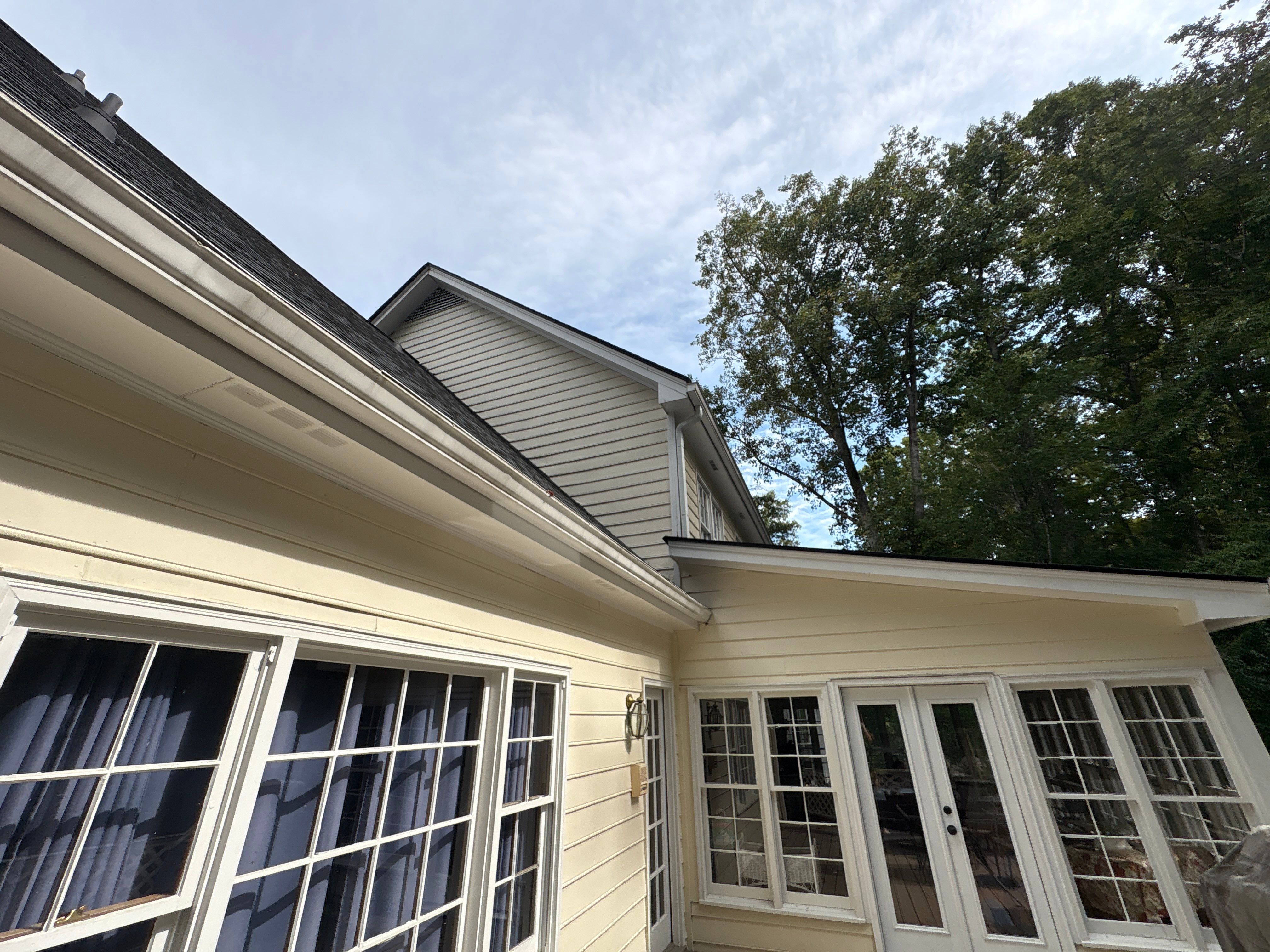 53 Window Replacements with Master 2800 Series Vinyl Replacement Windows and James Hardie Siding Installation by Nelson Exteriors 