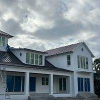 24ga 1.5" Mechanical Seam Dark Bronze by Total Roofing System The Metal Roof Experts