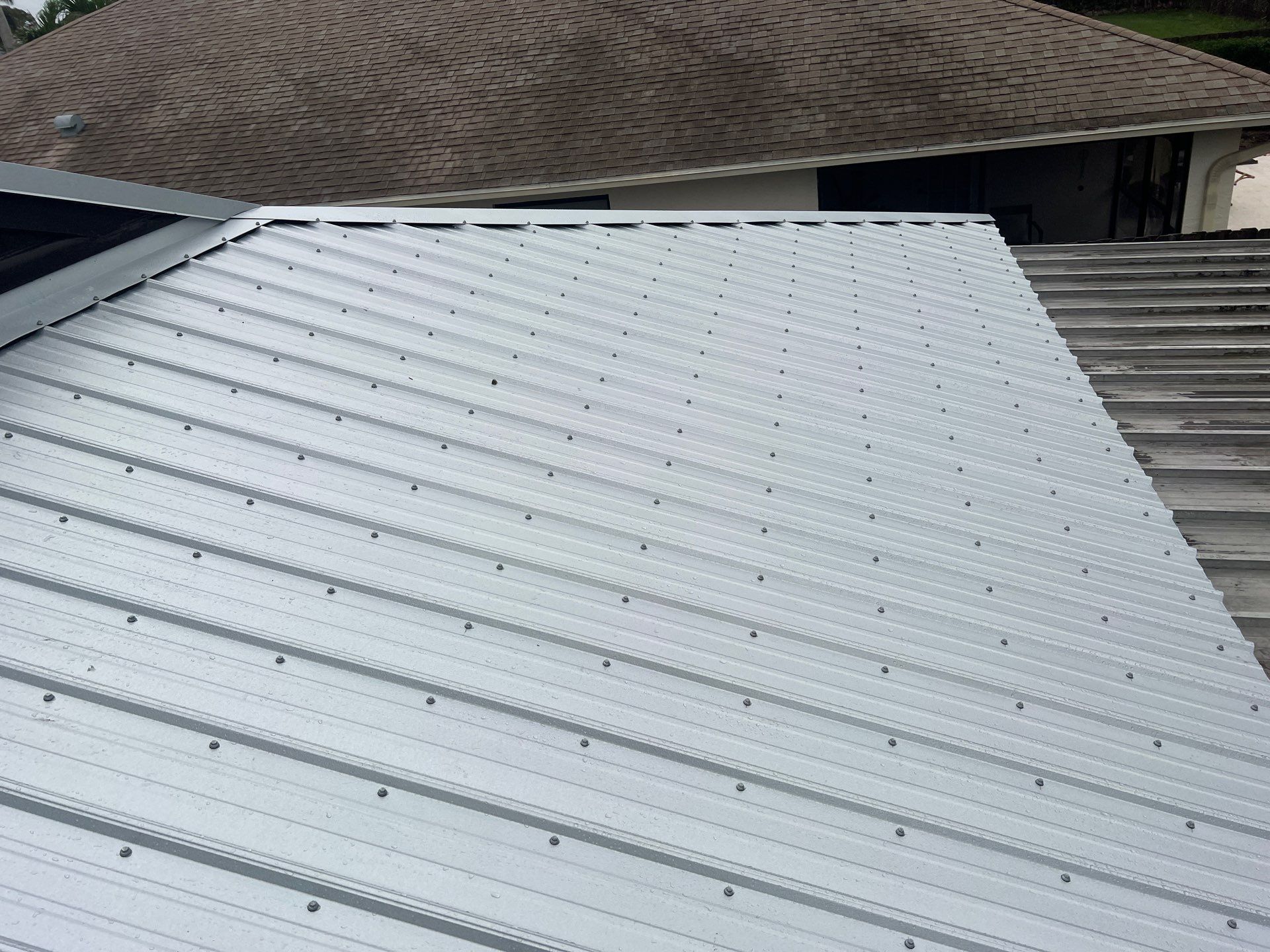 Residential Roofing Installation using Durabull Classic Rib Panel by Durabilis Roofing INC