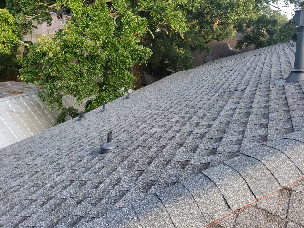 Residential Roofing Installation by American Roofing & Construction LLC