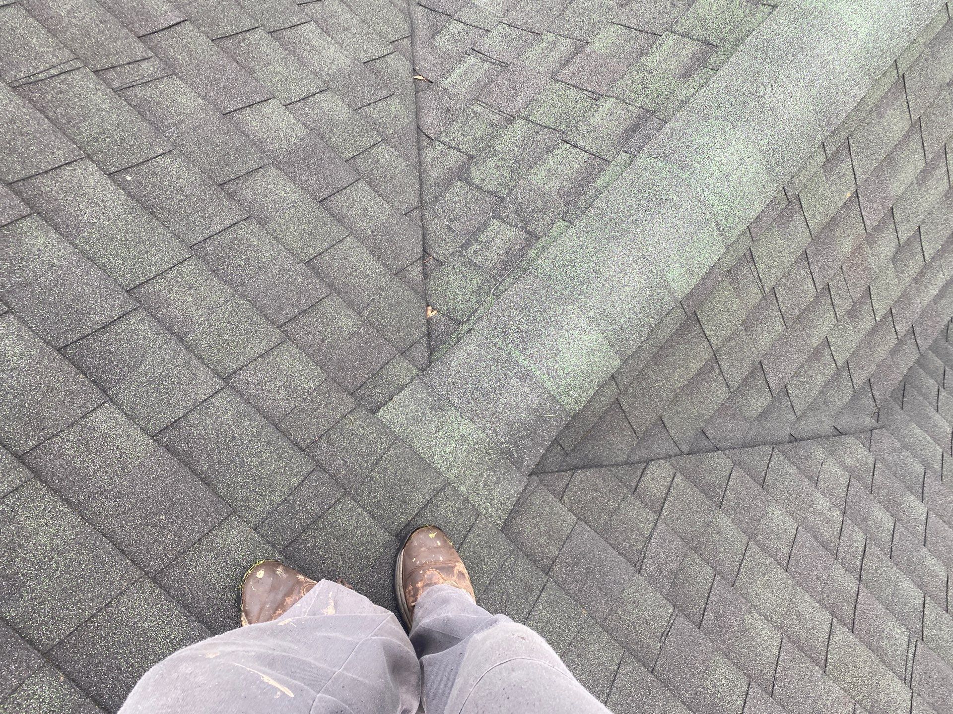 Green Metal Roof and Custom Covered Deck in Duncannon by Esh Builders