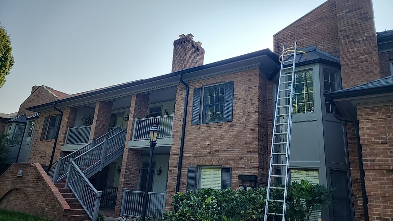 building clean using cleaner by Power Wash Masters LLC