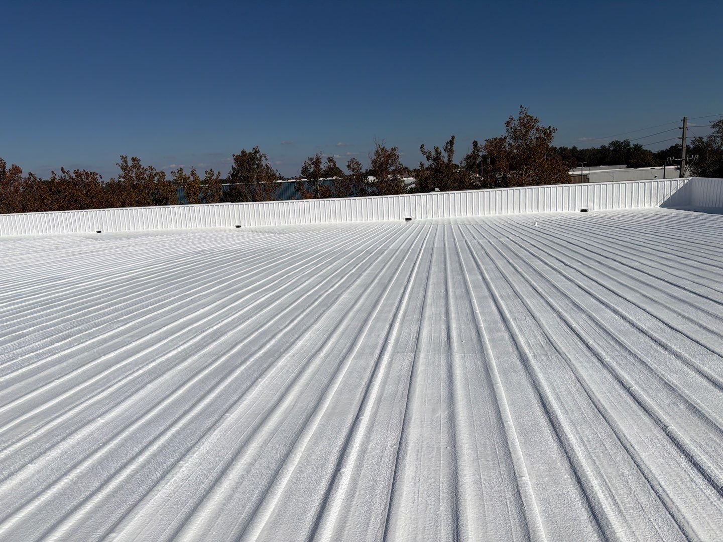 Orlando Commercial Metal Roof Restoration and Silicone Coating System by CES Roofing