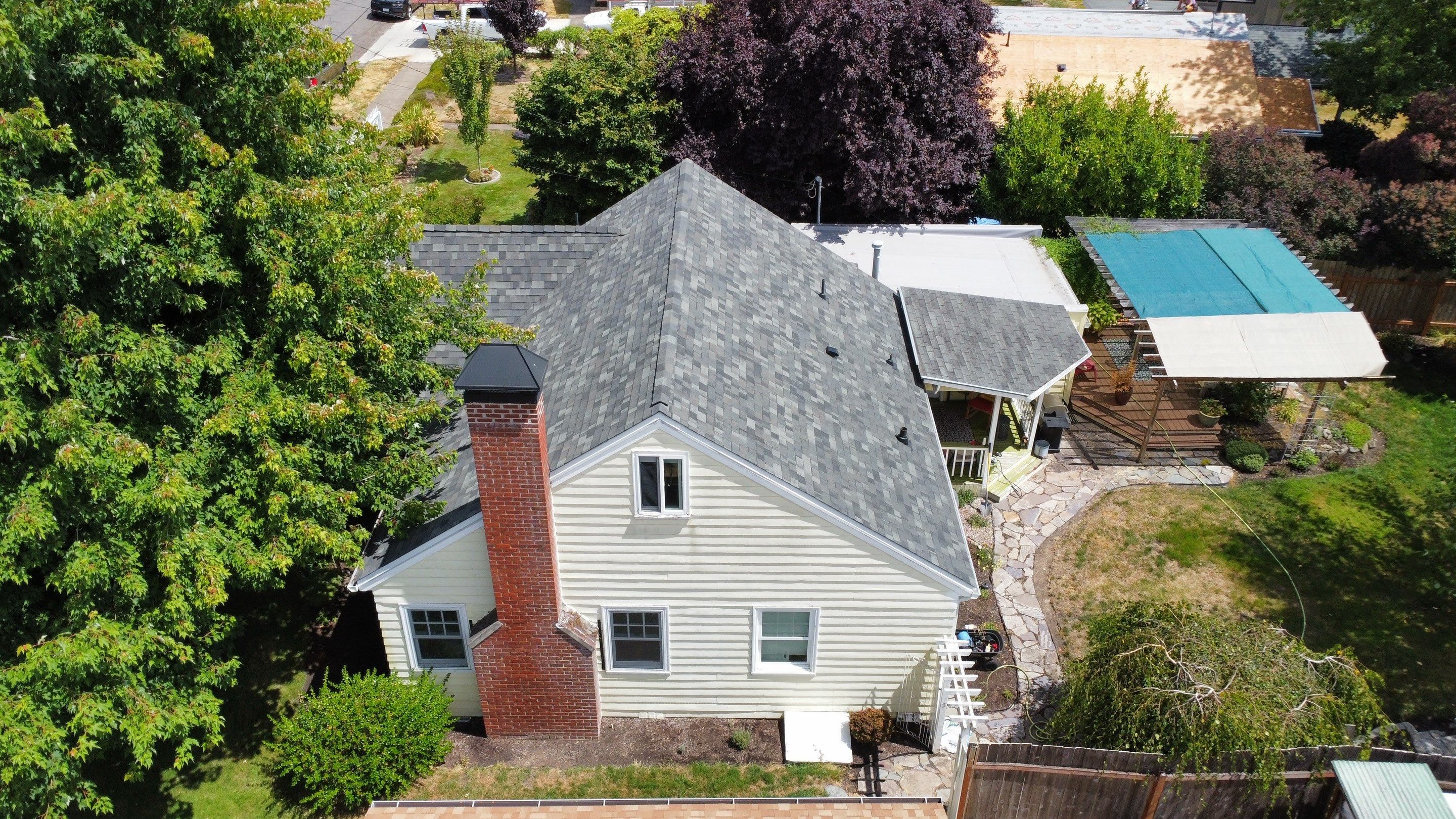 Residential Roof Installation with Added Insulation Barrier  using Malarkey Vista AR Shingles (Color: Storm Grey) by Orezona Building & Roofing Company, Inc.