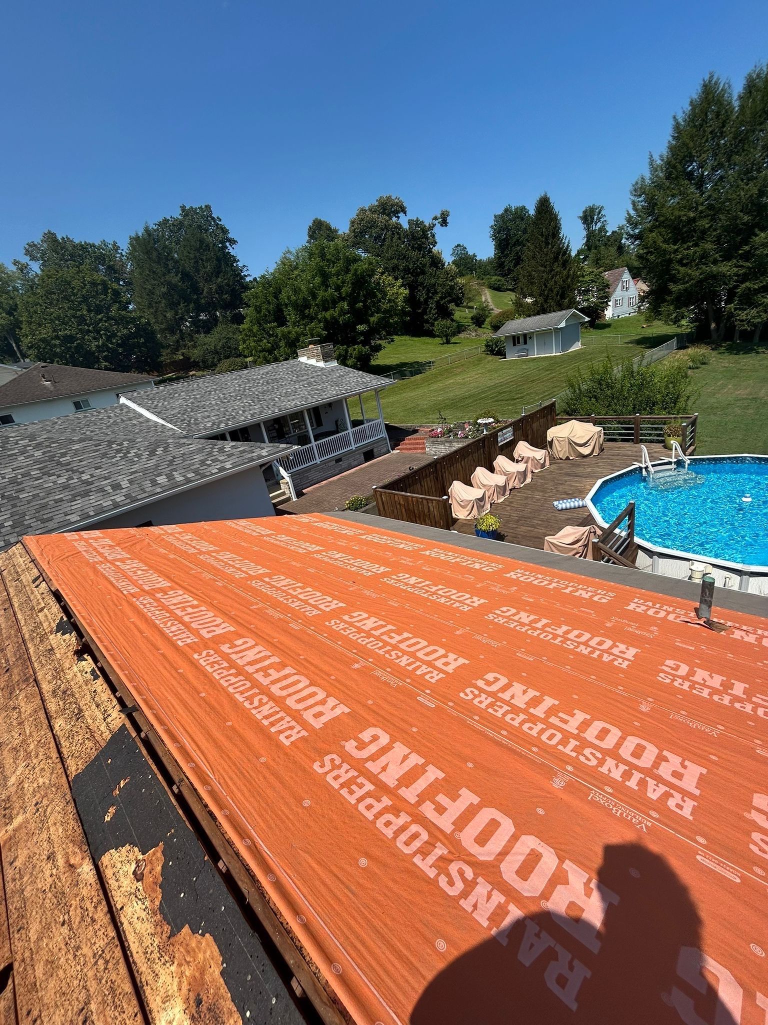 Residential Roofing Installation using GAF Timberline HDZ Charcoal by Rainstoppers Roofing