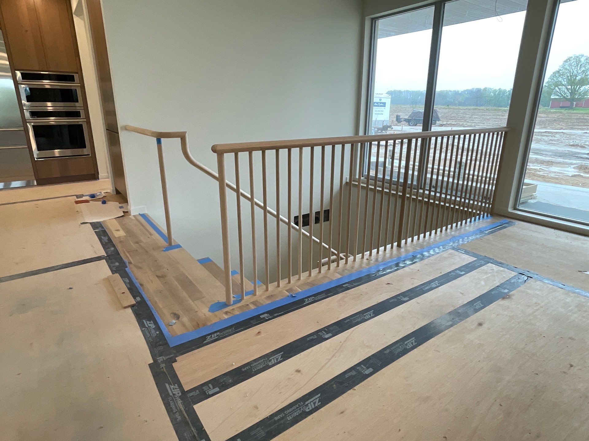 Hand Carved Staircase steals the show by RTBaldwin Hardwood Floors