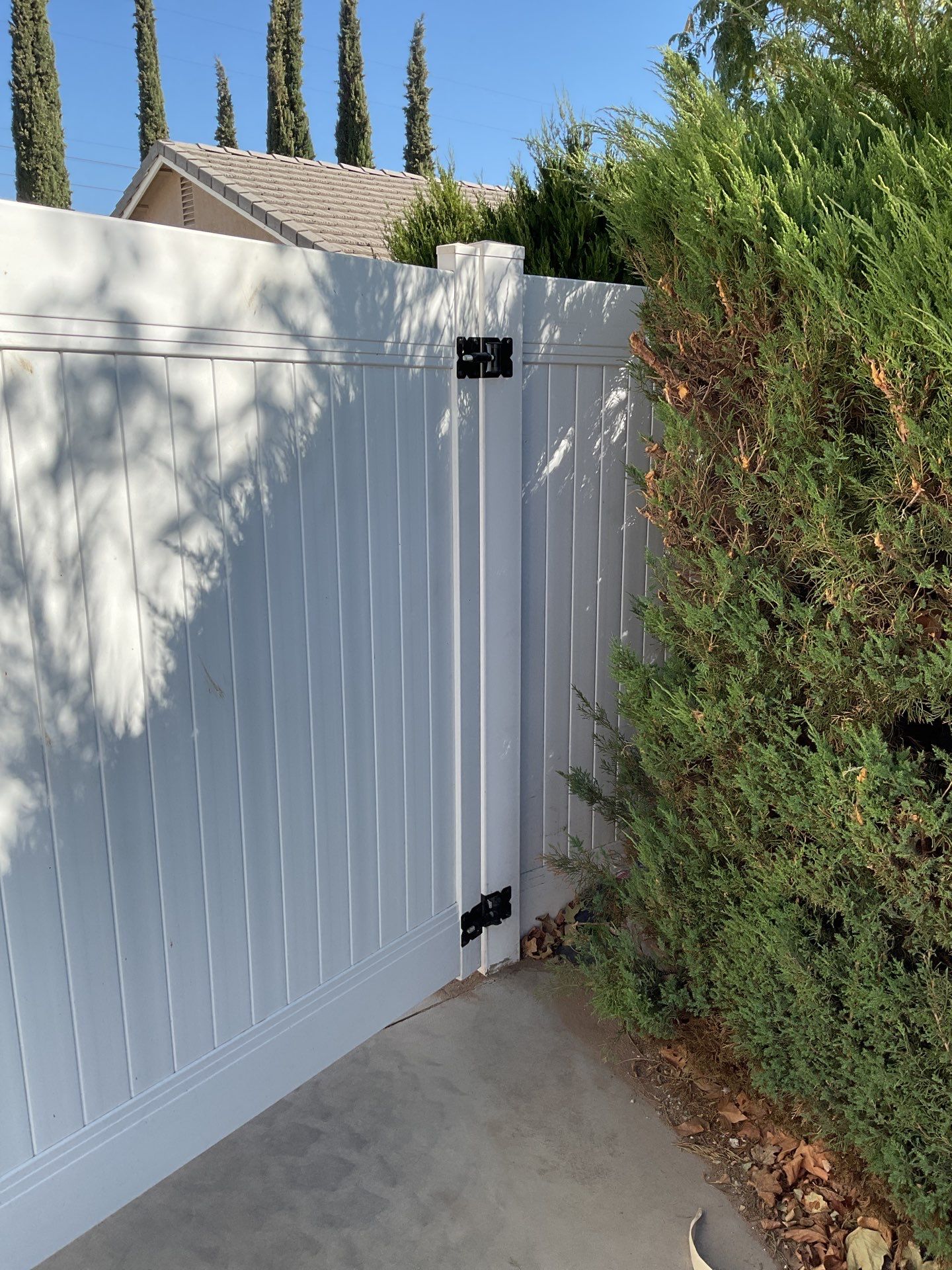 Gate installation using Vinyl by Fence Guys Inc. 