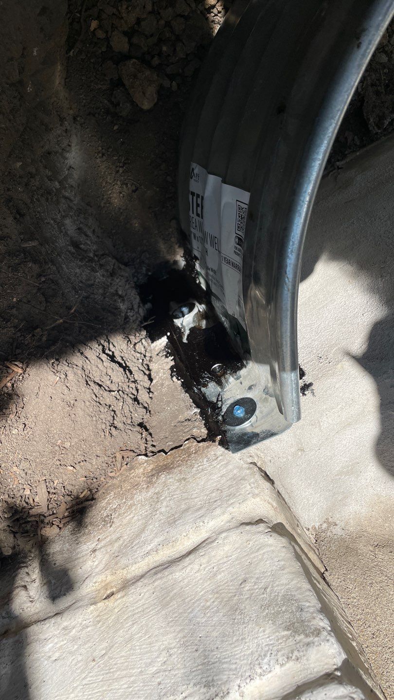 Drain Tile, Window Wells & Buried Discharge in Minneapolis by Waterproofing Northeast