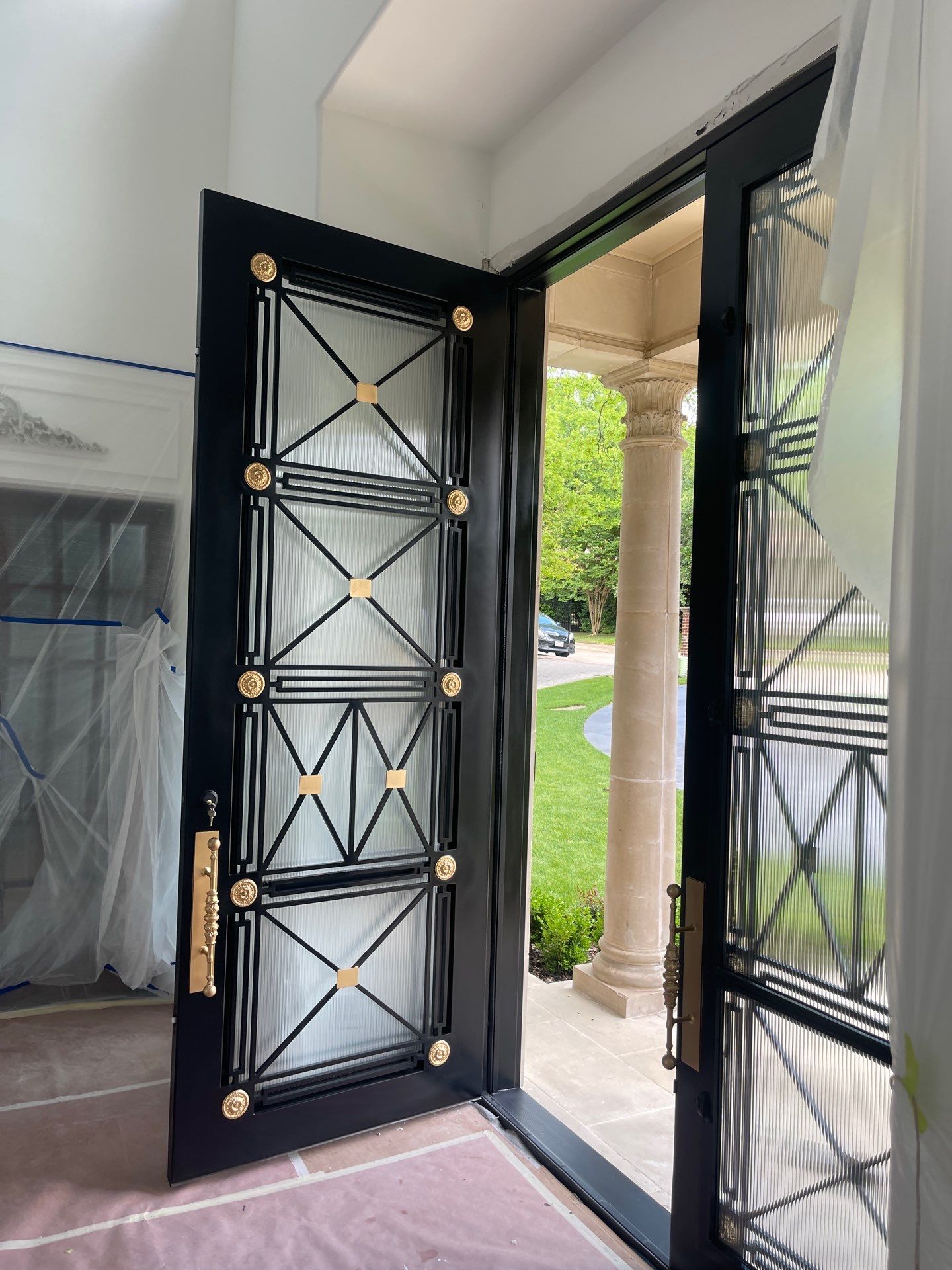 Modern Matte Black Front Door Installation in Dallas by Solara Custom Living