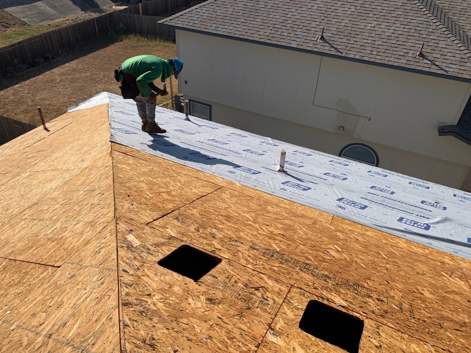 Asphalt Shingle Roof Replacement and Hail Damage Restoration in Hutto by Caliber Restoration LLC