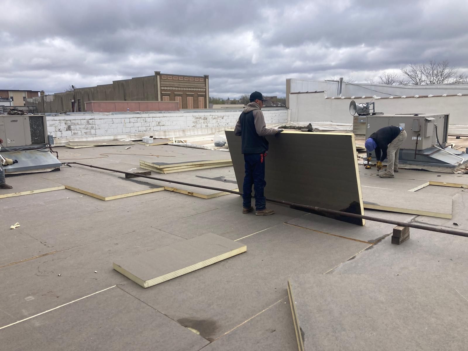 Full Roof Tear-off with new Code ISO insulation and 50 Mil Membrane by Grell Roofing, LLC