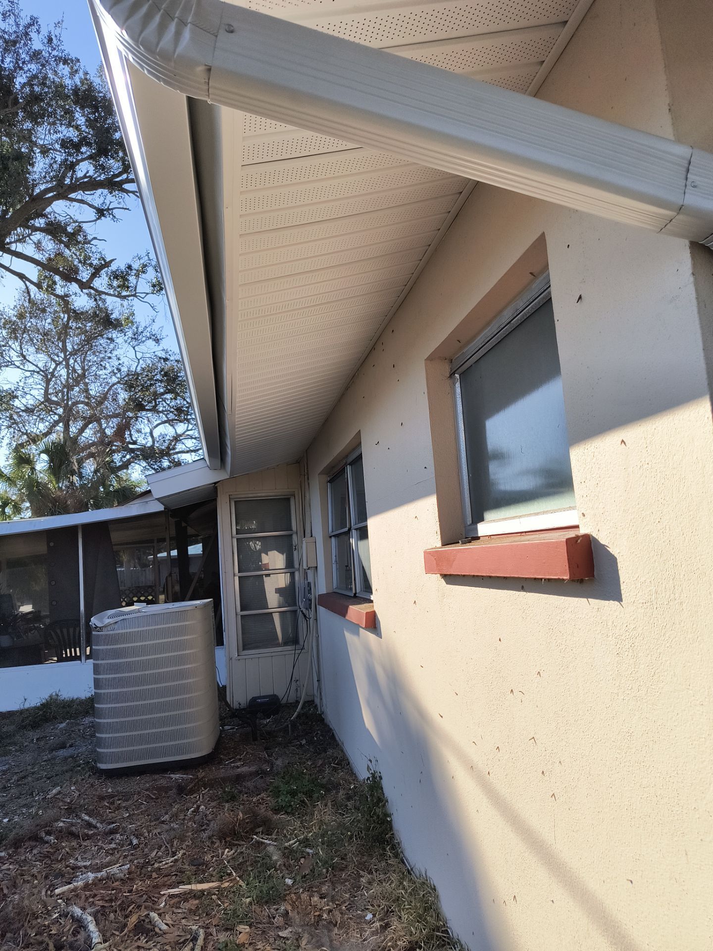 White Soffit and Fascia Upgrade in Sarasota FL by Gutter Professors