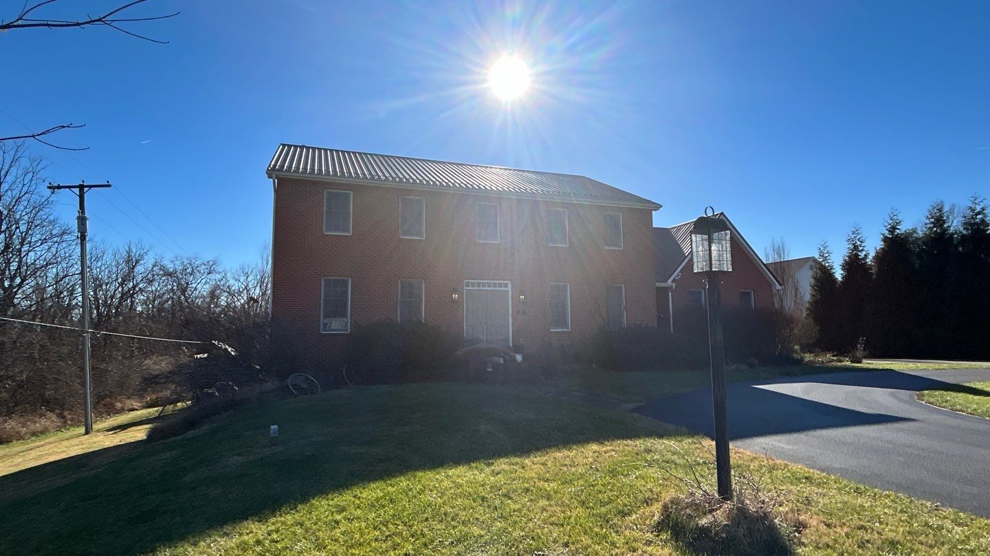 Residential Roofing Installation using Performance Panel Metal - Frost Black by RoofX 