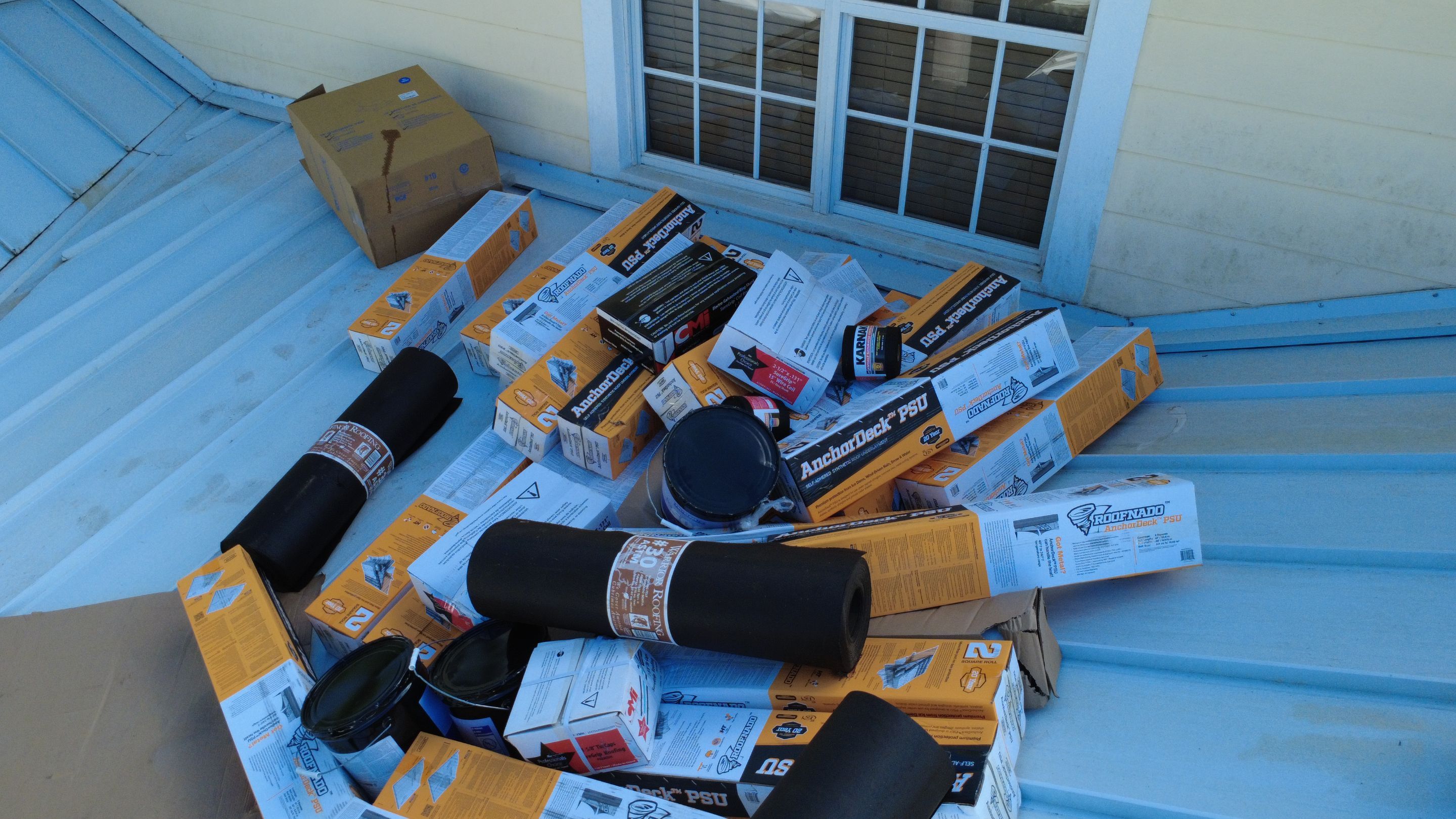 Residential Roofing Installation using 1" Nail strip metal roof by BLUES BROTHERS CONSTRUCTION CORP