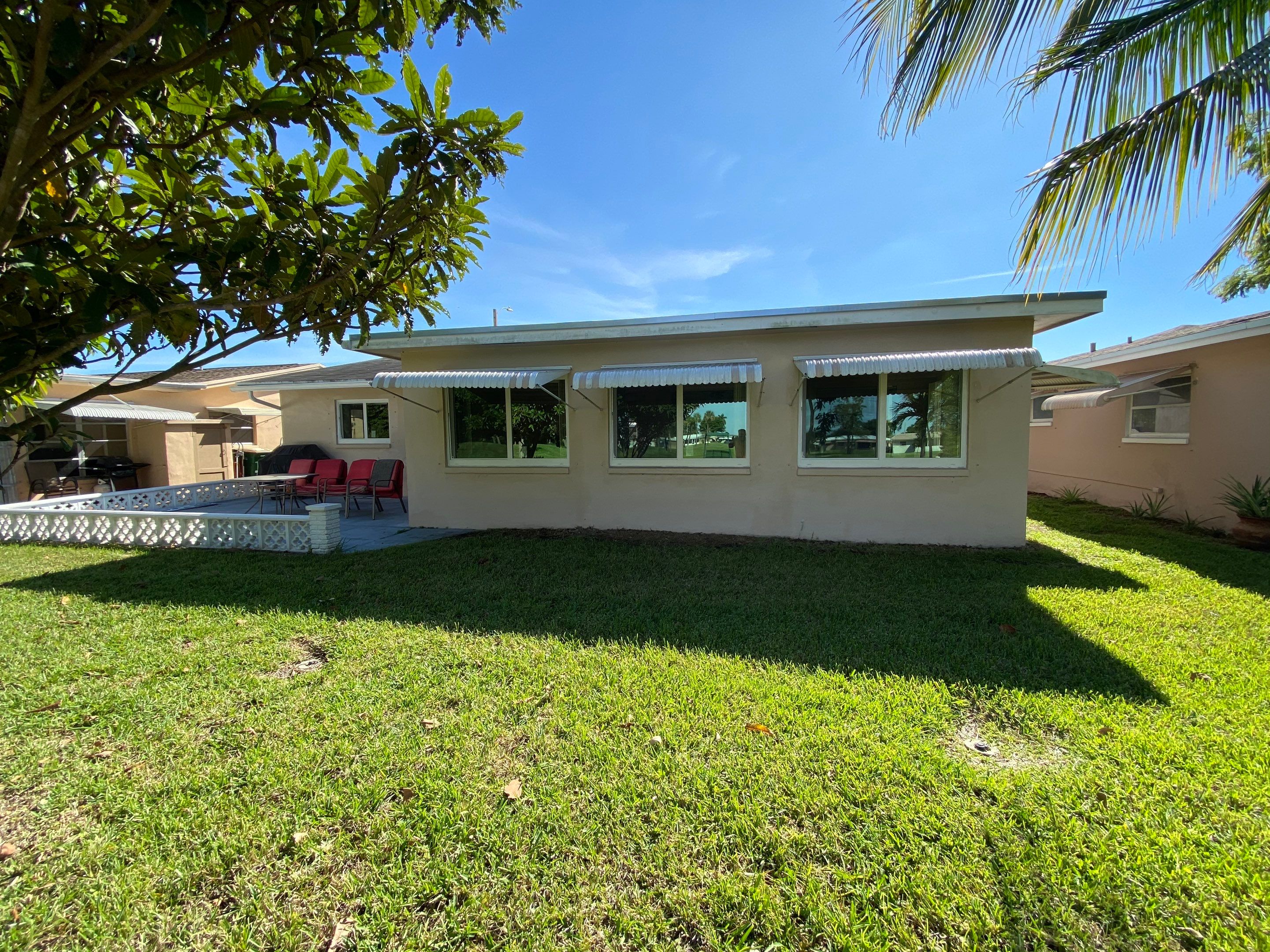 Tamarac Residential Entry Door and Aluminum Window Installation Project by The Door Doctor of South Florida, Inc.